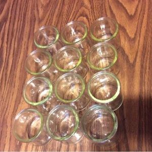 12 clean yoplait oui yogurt jars.